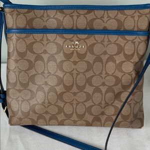 Coach Signature Coated Canvas File Crossbody Bag with blue leather trim